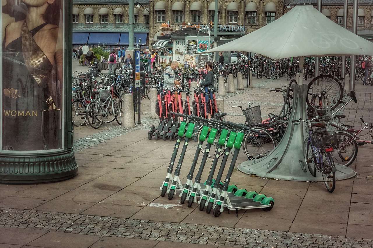 Electric scooters parked in a row